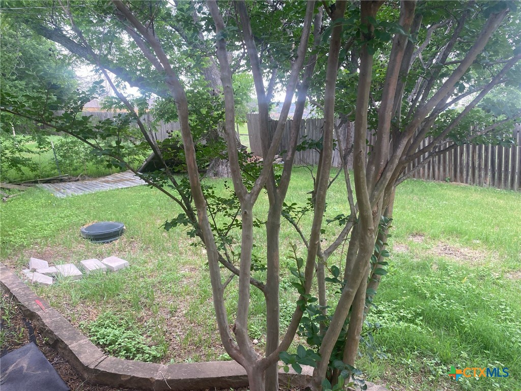 4801 Renick Ranch Road Killeen, TX 76549 - Photo 27 of 29 a view of backyard with green space and seating