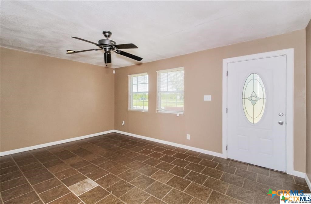 4801 Renick Ranch Road Killeen, TX 76549 - Photo 7 of 29 an empty room with windows and fan