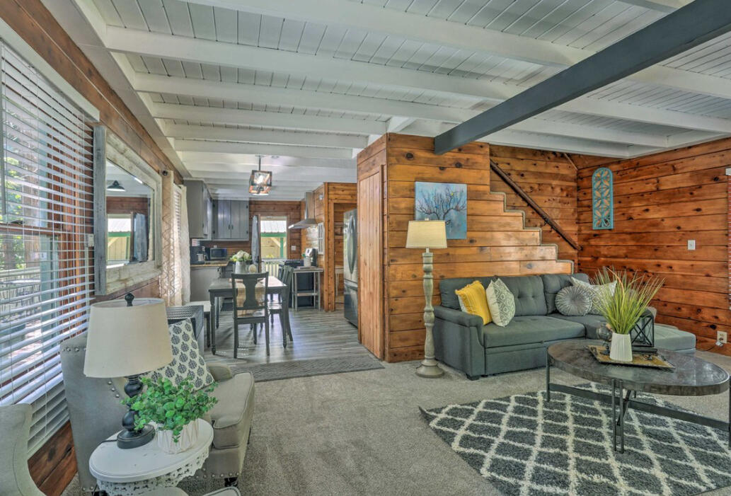 42036 Tollhouse Road Shaver Lake, CA 93664 - Photo 12 of 30 a living room with furniture and a potted plant