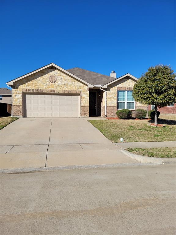 1633 Kawati Way Krum, TX 76249 - Photo 1 of 17 a front view of a house with a yard