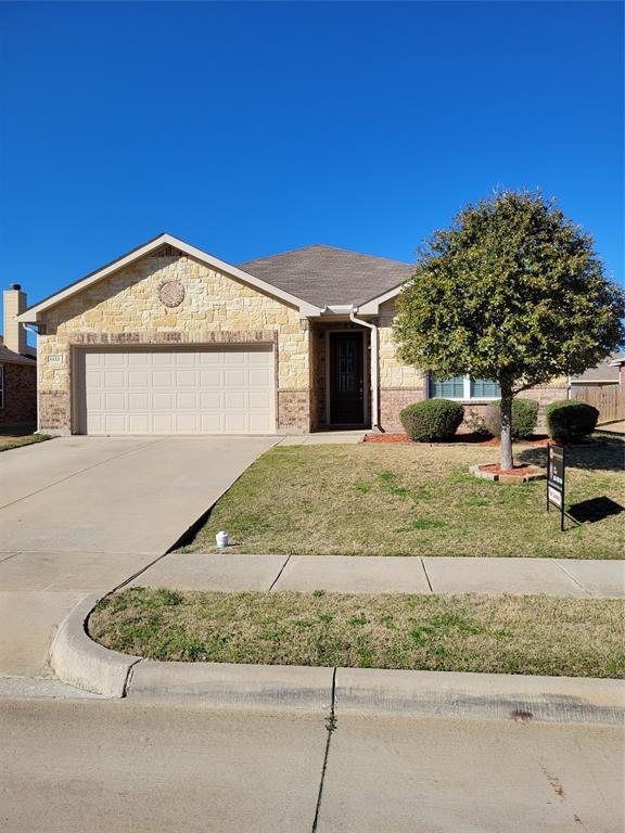 1633 Kawati Way Krum, TX 76249 - Photo 2 of 17 a front view of a house with a garden