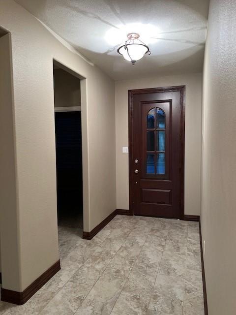 1633 Kawati Way Krum, TX 76249 - Photo 3 of 17 an empty room with a bathroom and a sink