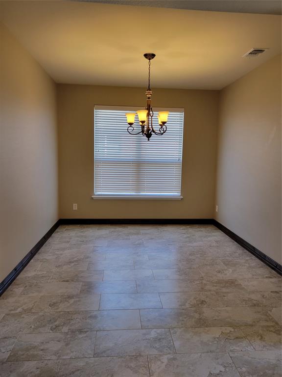 1633 Kawati Way Krum, TX 76249 - Photo 5 of 17 a view of a room with a chandelier