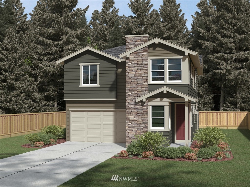 17708 38th Drive Southeast, Unit 2 Bothell, WA 98012 - Photo 1 of 1 a front view of a house with a yard and garage