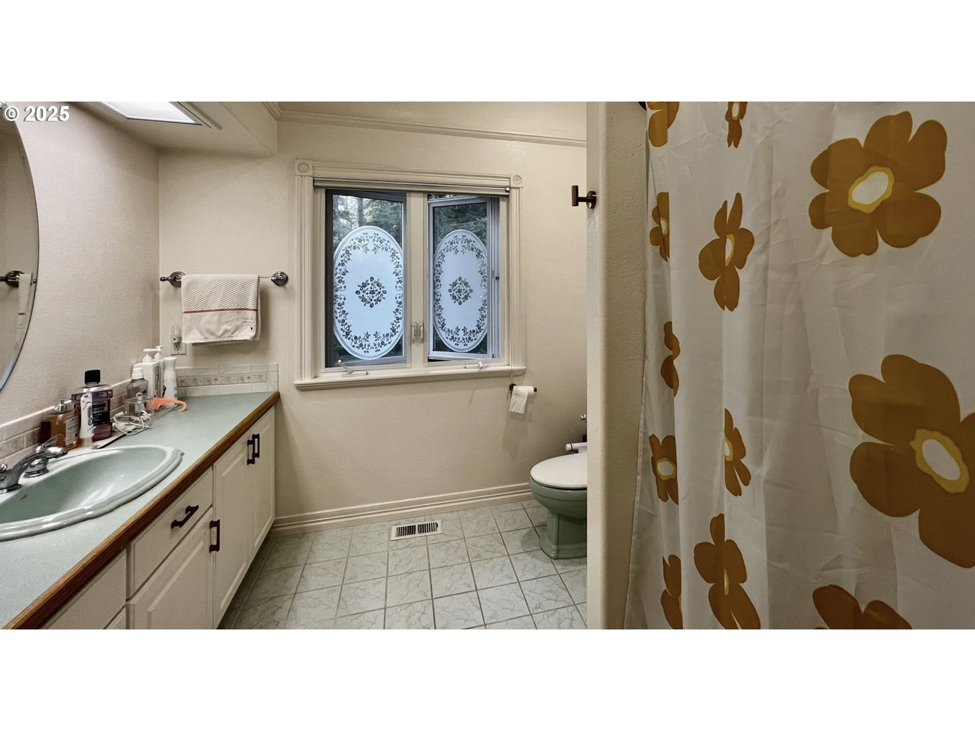 2719 Alder Ridge Drive North Bend, OR 97459 - Photo 15 of 27 a bathroom with a sink toilet and shower