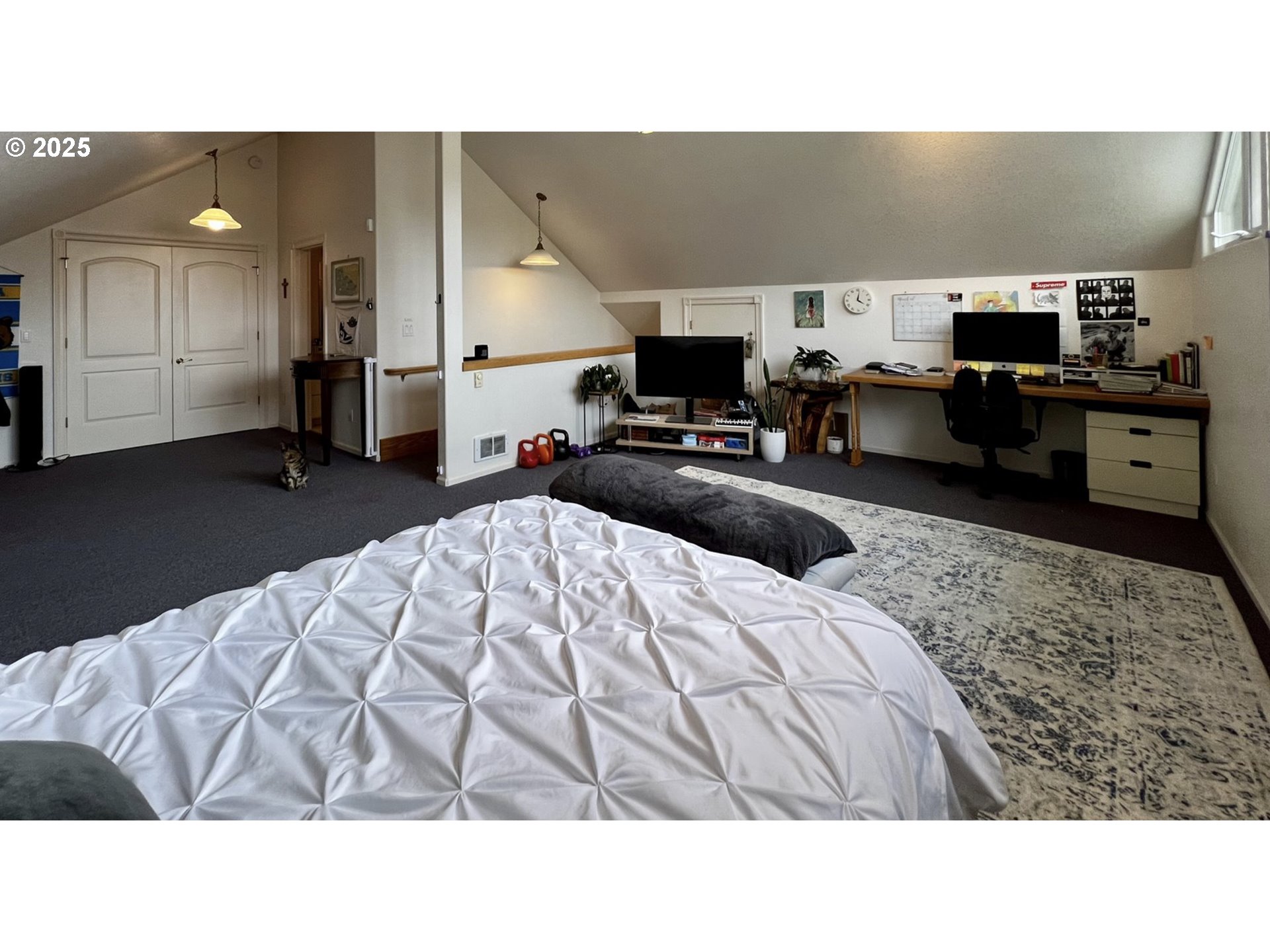 2719 Alder Ridge Drive North Bend, OR 97459 - Photo 19 of 27 a living room with furniture and a flat screen tv