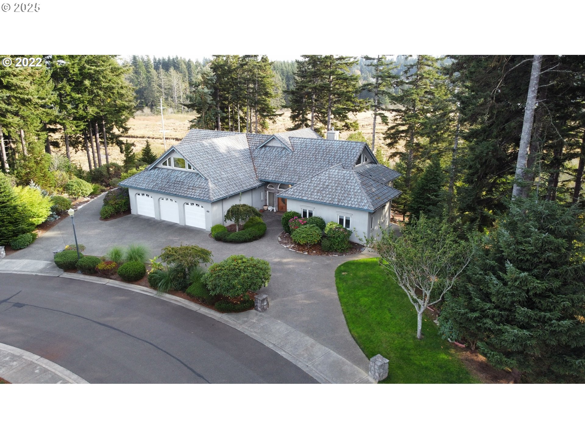 2719 Alder Ridge Drive North Bend, OR 97459 - Photo 2 of 27 a view of a street with a large parking space