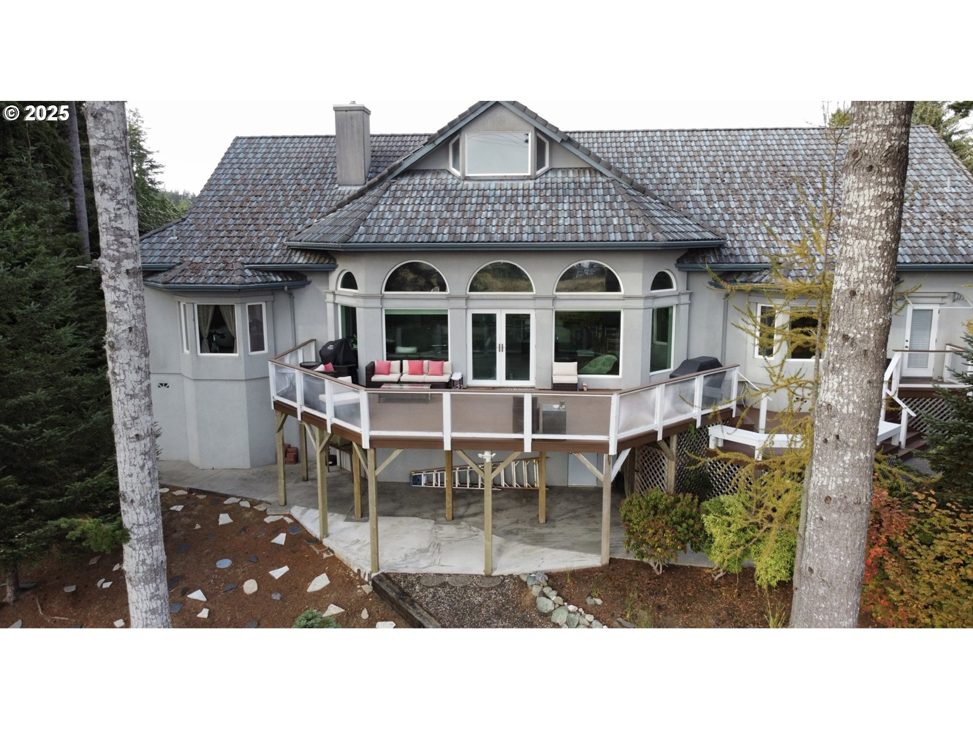 2719 Alder Ridge Drive North Bend, OR 97459 - Photo 4 of 27 a black and white photo of a house