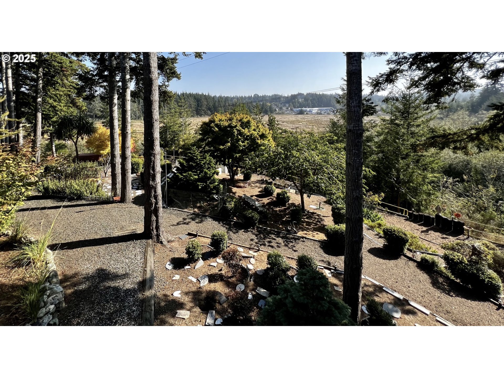 2719 Alder Ridge Drive North Bend, OR 97459 - Photo 7 of 27 a black and white photo of a city