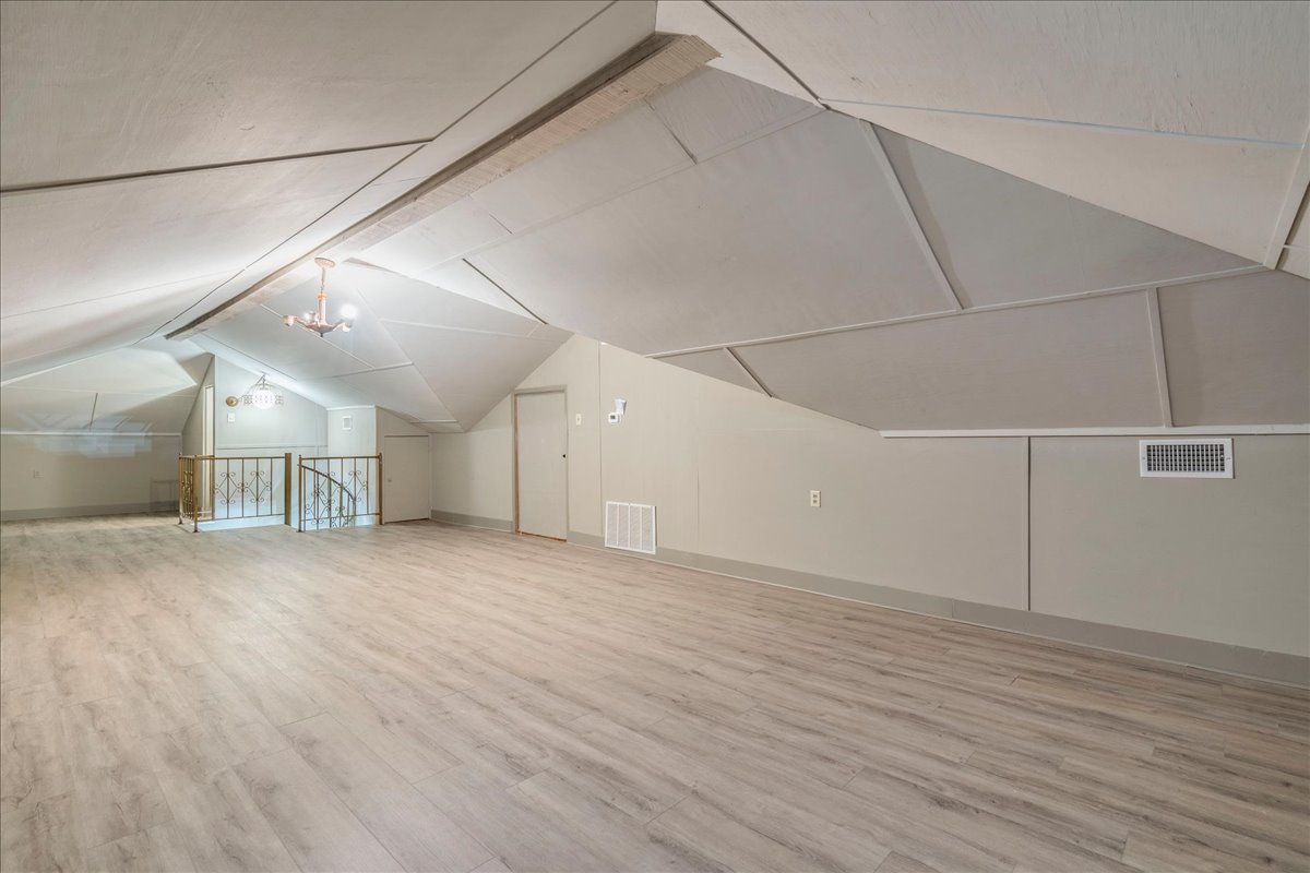 6400 Cypress Road Kyle, TX 78640 - Photo 27 of 33 Spacious upper-level room featuring wood-finish flooring and a light neutral paint palette