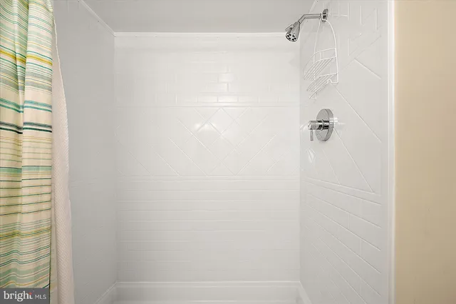 a white refrigerator freezer sitting inside of a kitchen