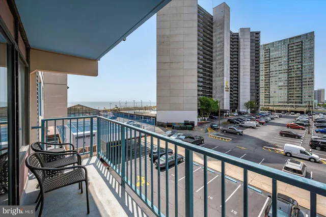 a view of balcony with chairs