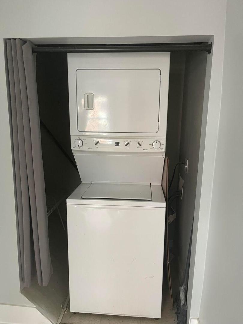 67 West Chestnut Street, Unit 4 Chicago, IL 60610 - Photo 13 of 13 a utility room with dryer and washer