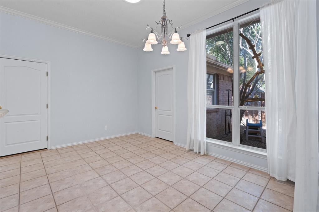 4 Brookway Court Mansfield, TX 76063 - Photo 14 of 38 wooden floor in an empty room with a window