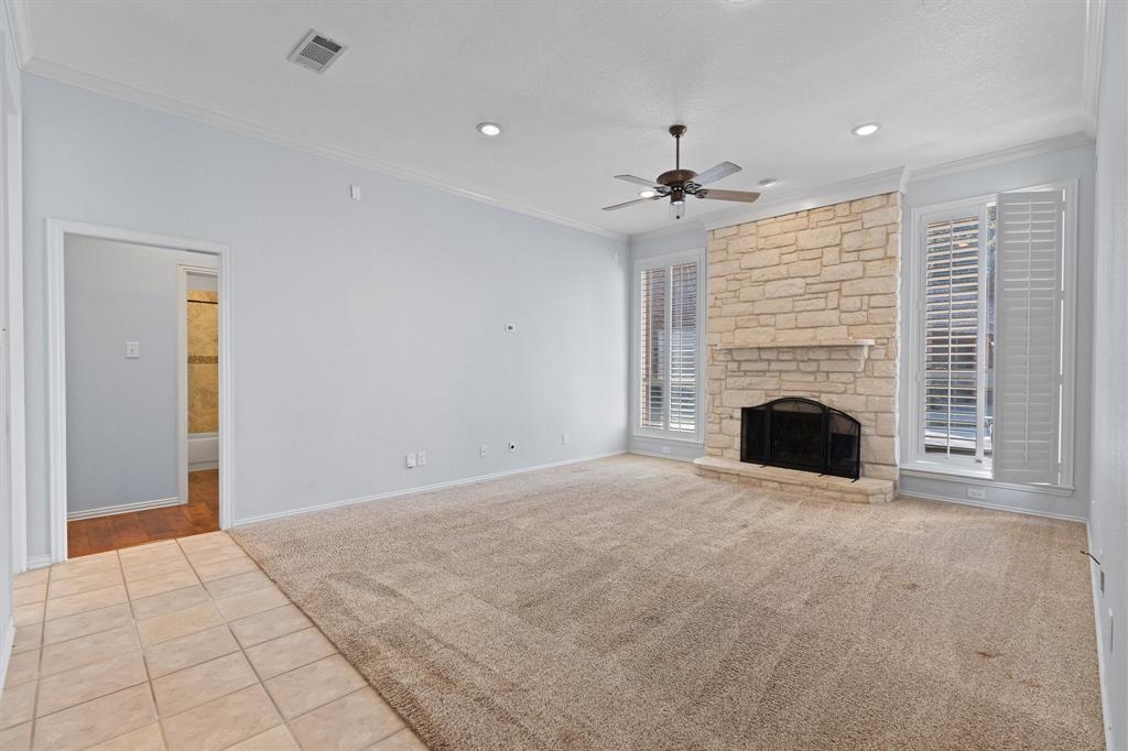 4 Brookway Court Mansfield, TX 76063 - Photo 15 of 38 a view of an empty room with a fireplace