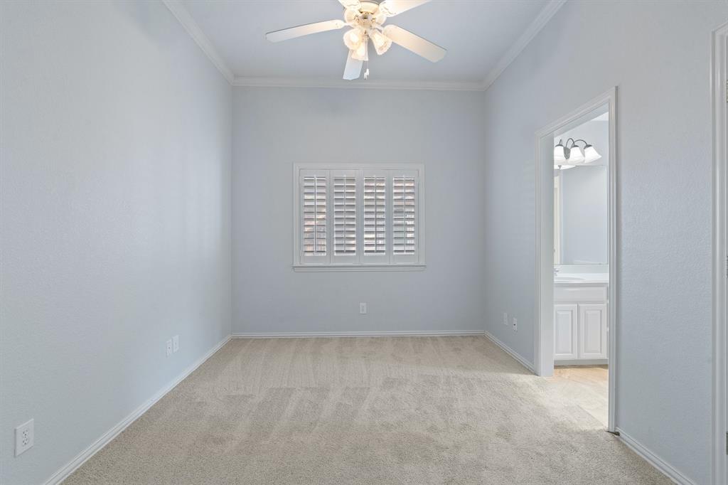 4 Brookway Court Mansfield, TX 76063 - Photo 28 of 38 an empty room with a window and a fan