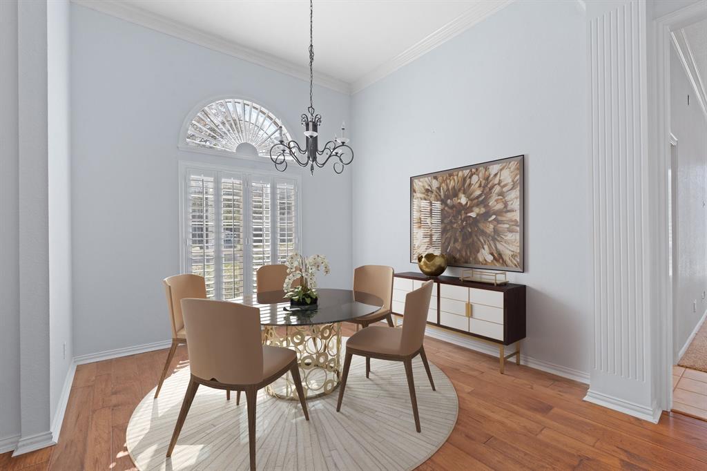 4 Brookway Court Mansfield, TX 76063 - Photo 4 of 38 a view of a dining room with furniture wooden floor and chandelier