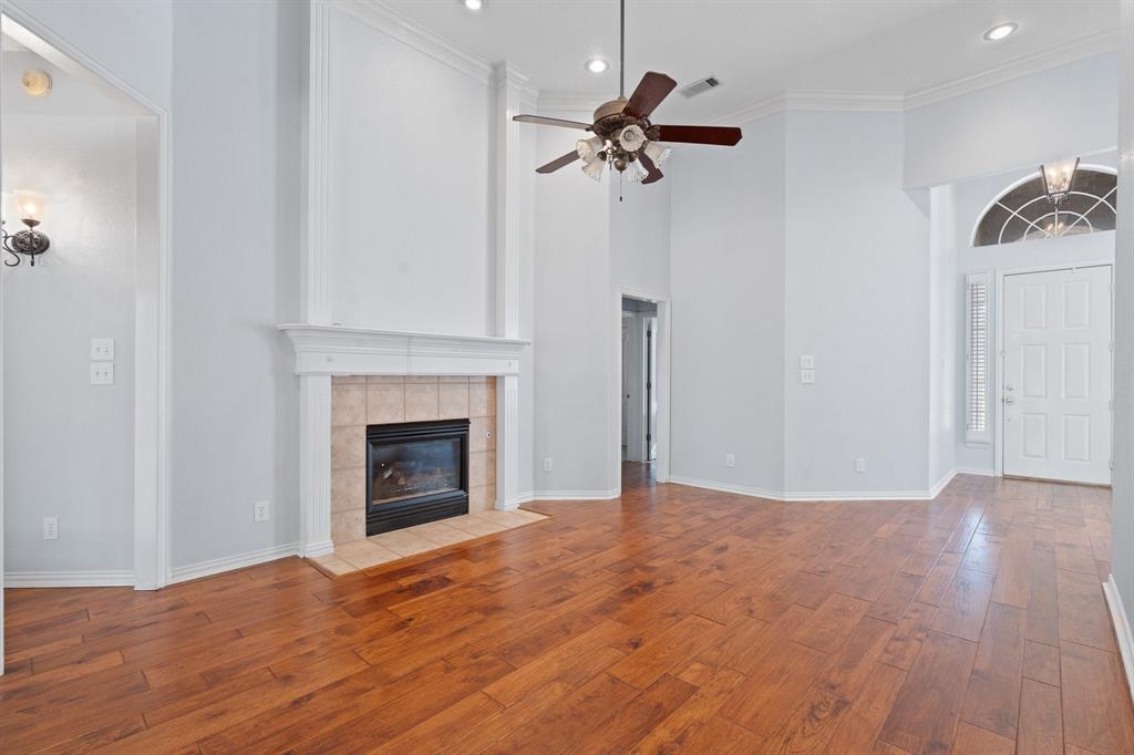 4 Brookway Court Mansfield, TX 76063 - Photo 7 of 38 a view of empty room with a fireplace