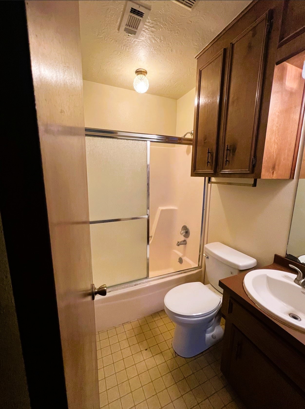 102 Briar Ridge Drive Bellville, TX 77418 - Photo 14 of 15 a white toilet sitting next to a bathroom sink