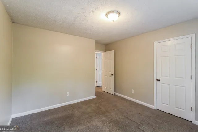 an empty room with an entryway