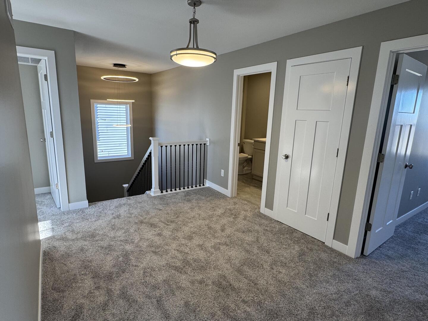 3618 Cabernet Court Normal, IL 61761 - Photo 14 of 16 a view of a hallway to rooms