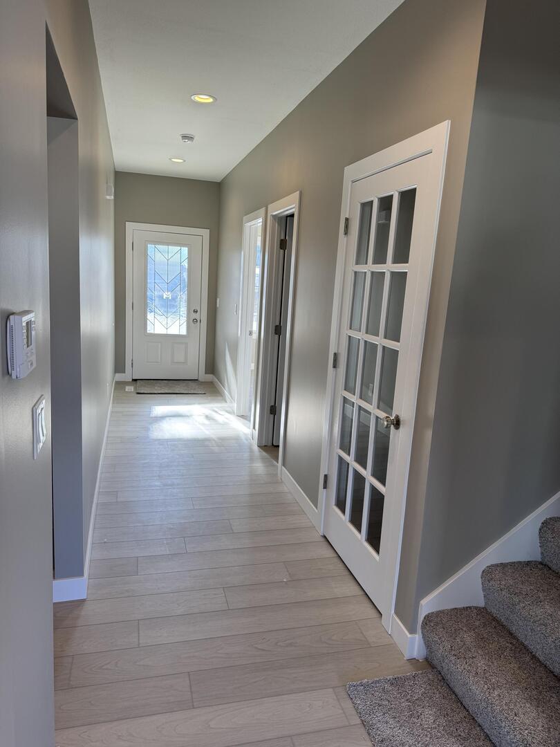 3618 Cabernet Court Normal, IL 61761 - Photo 7 of 16 a view of livingroom with hardwood floor and hallway