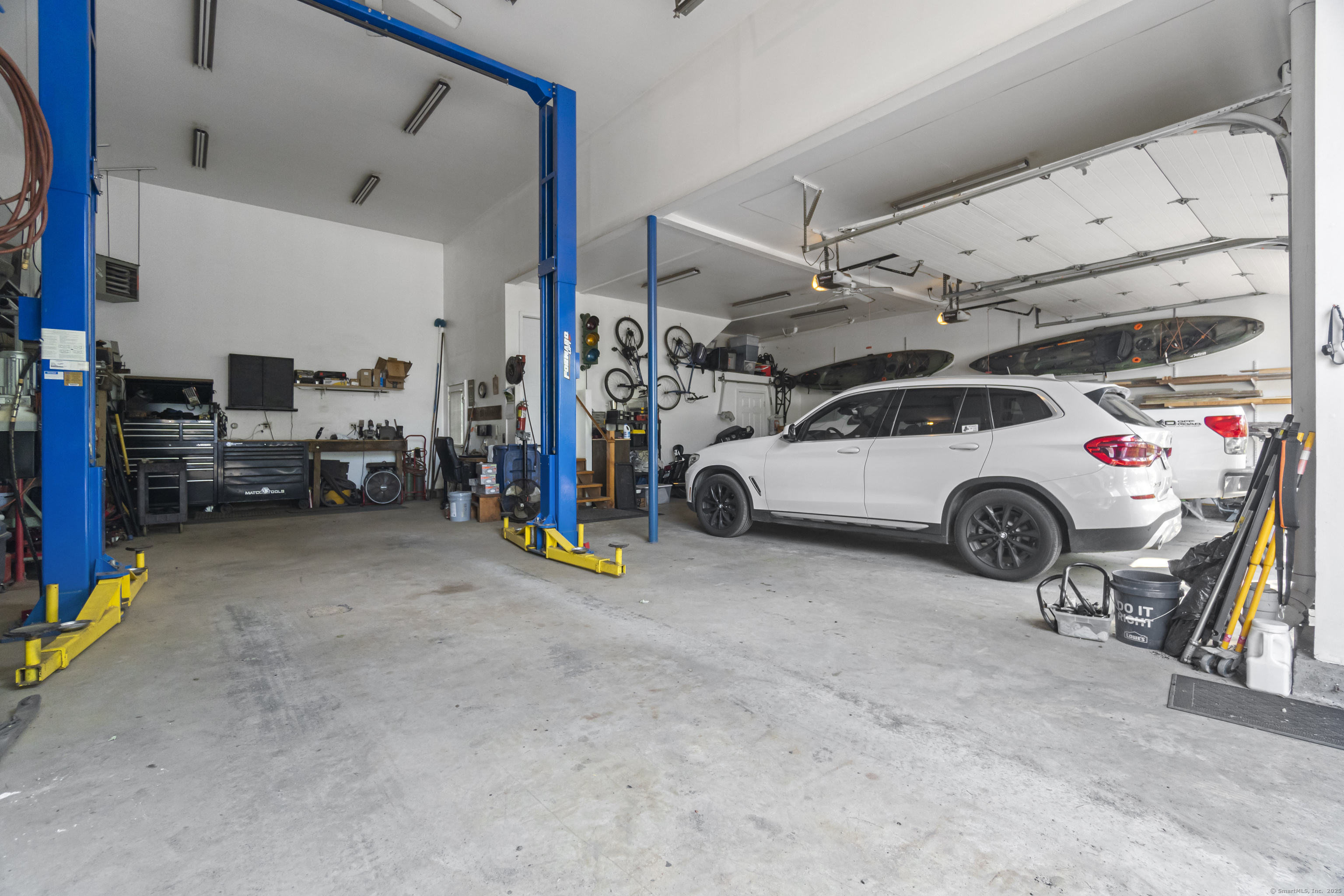319 Main Street South Bethlehem, CT 06751 - Photo 23 of 33 a view of parking garage with cars and parked car