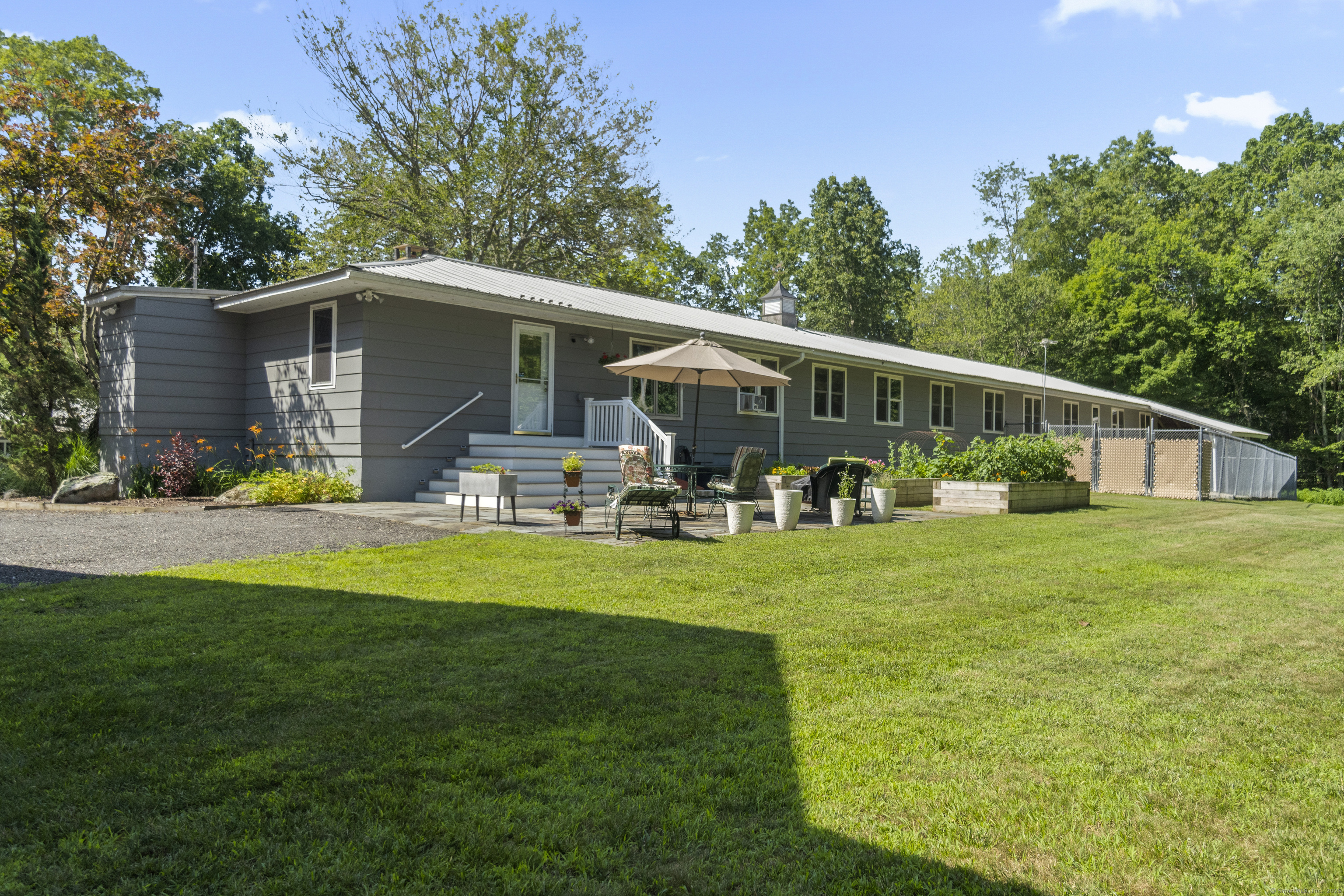 319 Main Street South Bethlehem, CT 06751 - Photo 26 of 33 a front view of house with garden and trees
