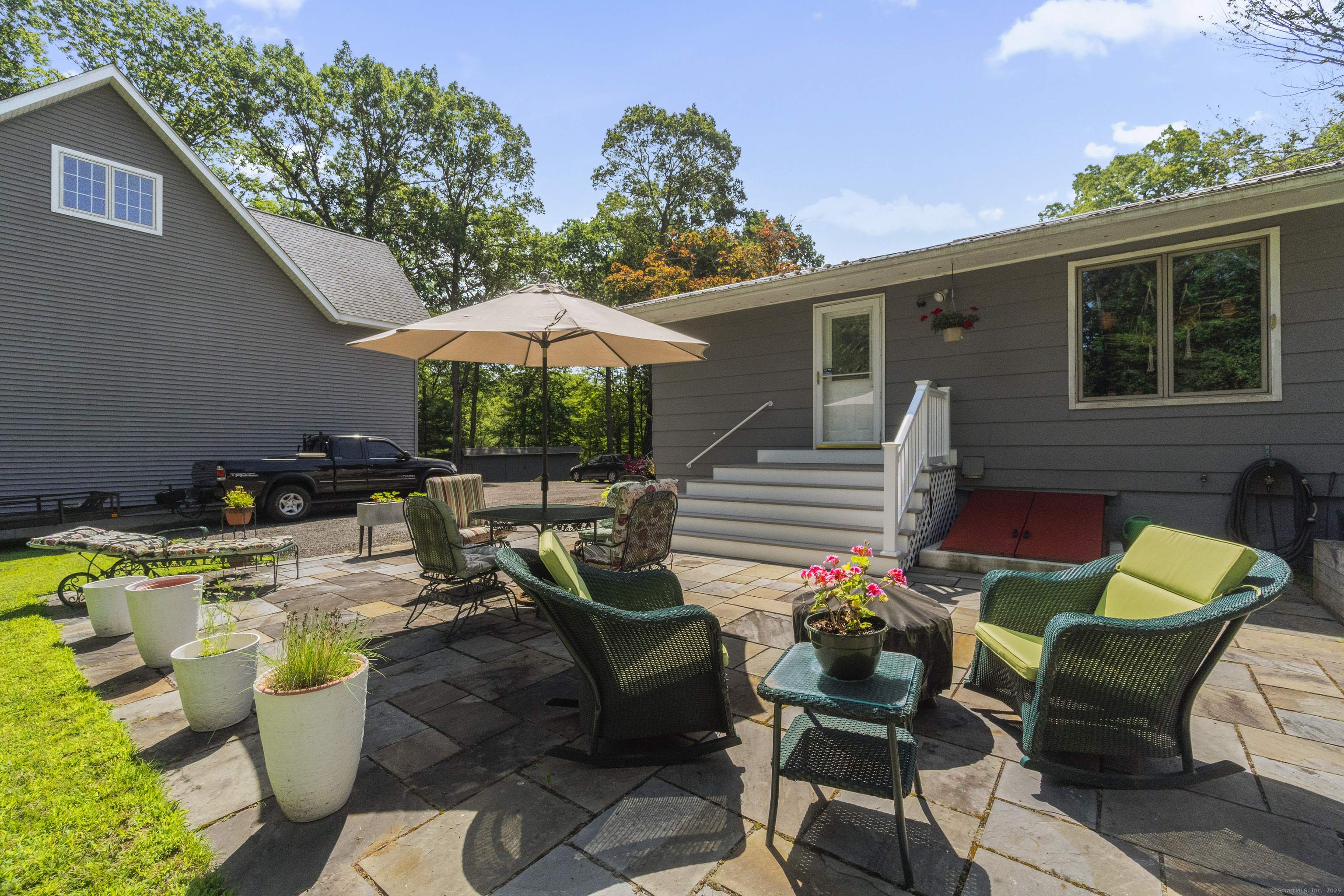 319 Main Street South Bethlehem, CT 06751 - Photo 30 of 33 a view of a chairs and table in patio