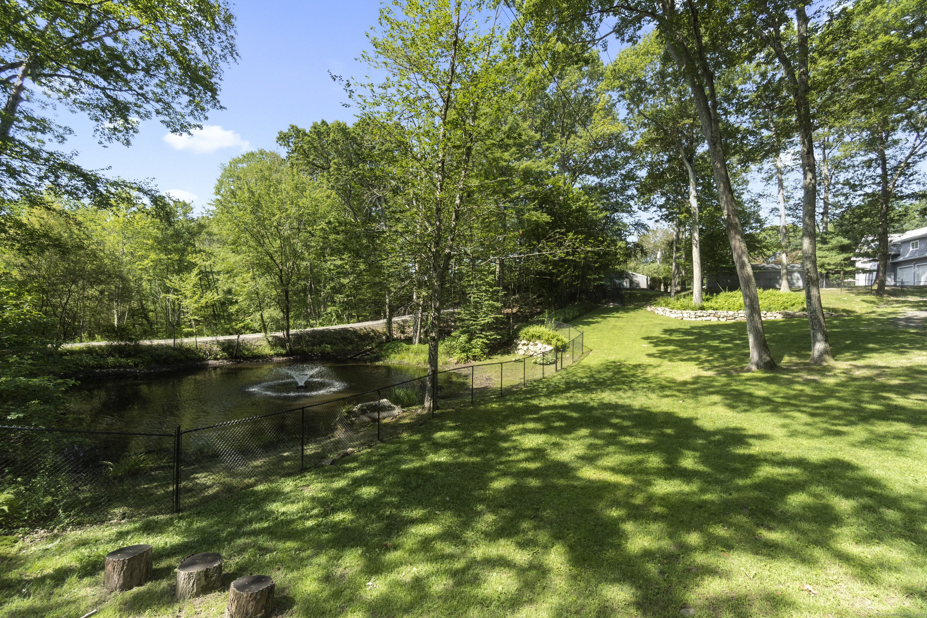 319 Main Street South Bethlehem, CT 06751 - Photo 31 of 33 a backyard of a house with lots of green space