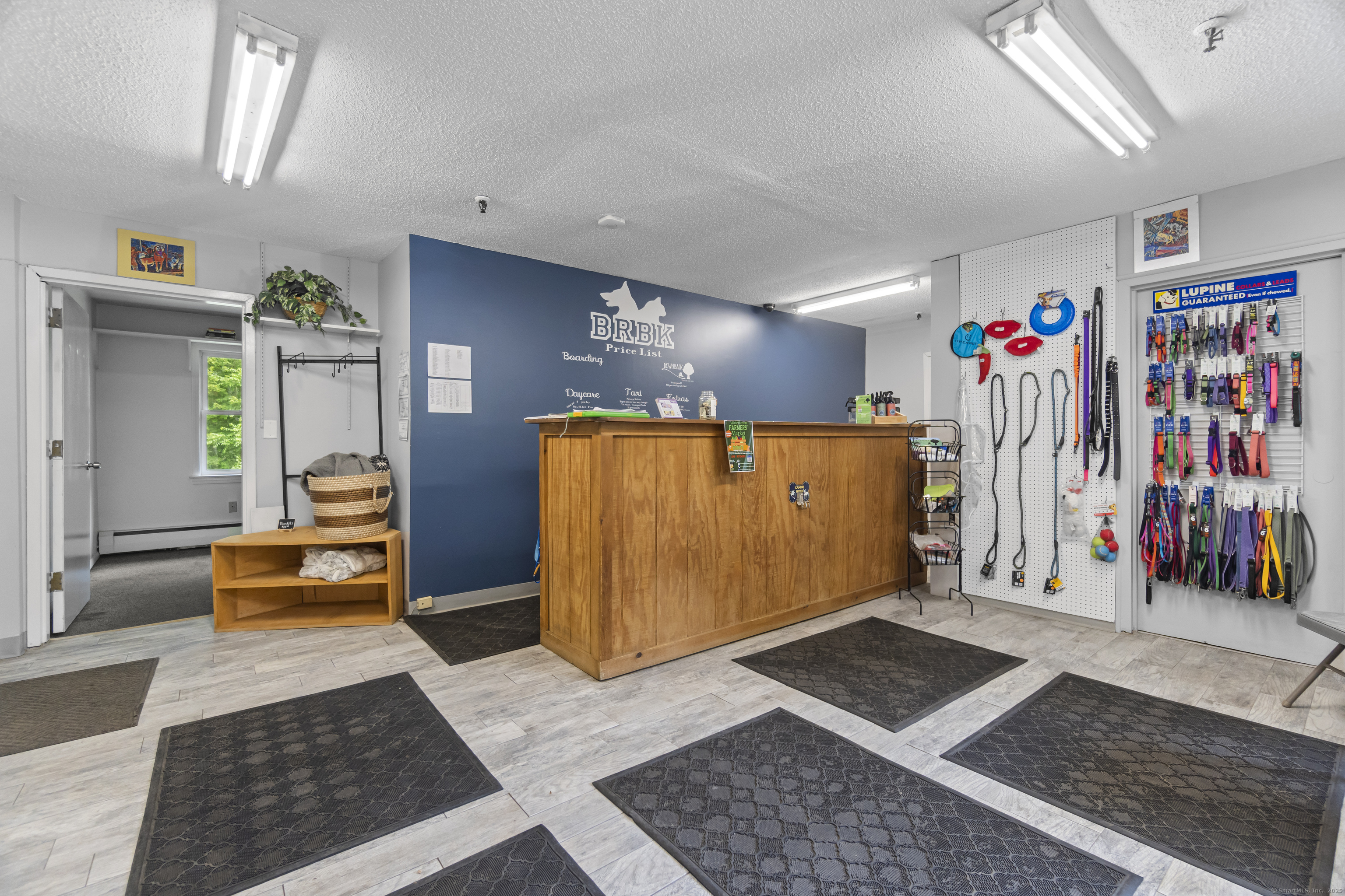 319 Main Street South Bethlehem, CT 06751 - Photo 4 of 33 a view of a hallway with a couch and dresser