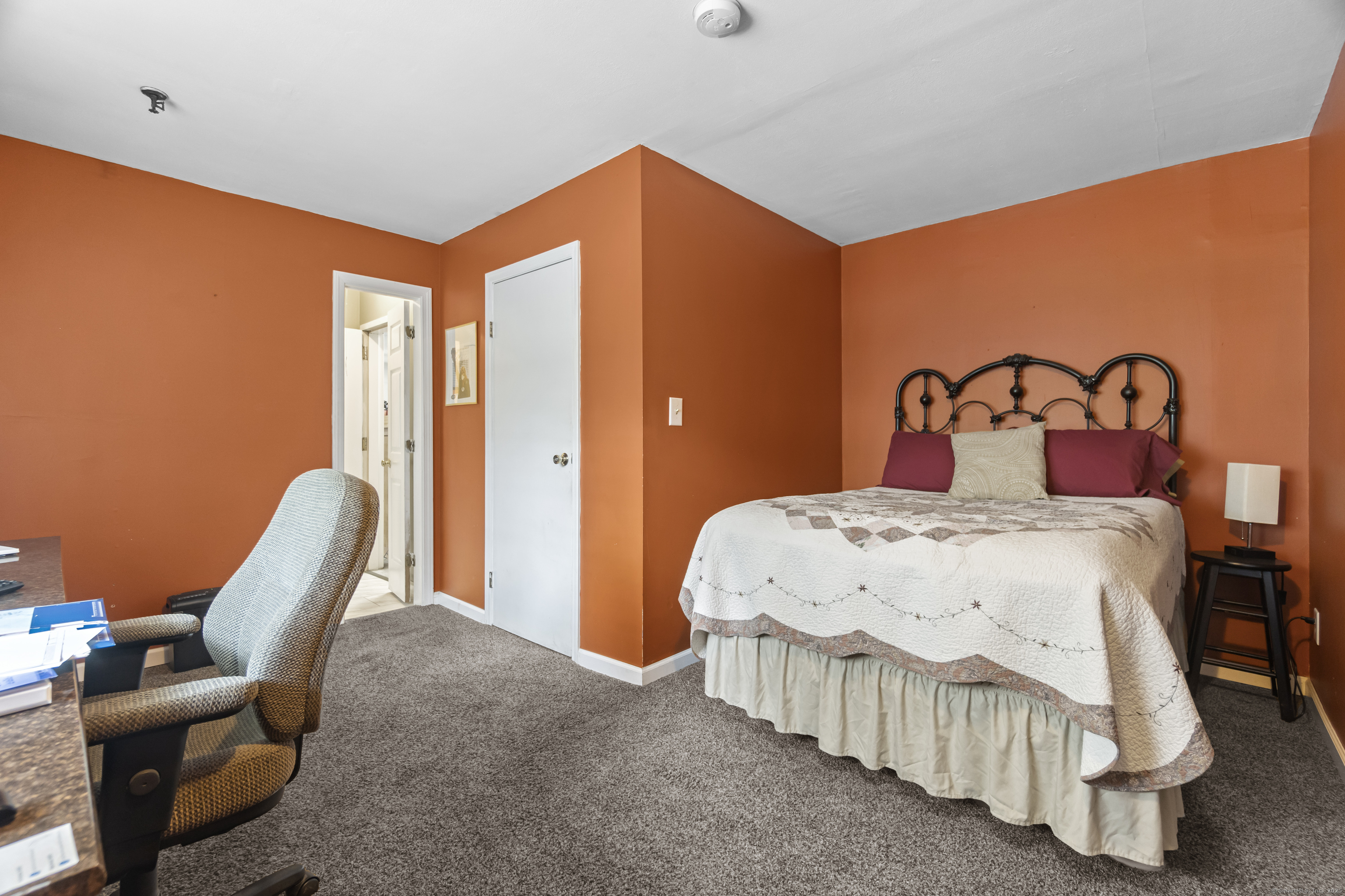 319 Main Street South Bethlehem, CT 06751 - Photo 5 of 33 a bedroom with a bed and a chair