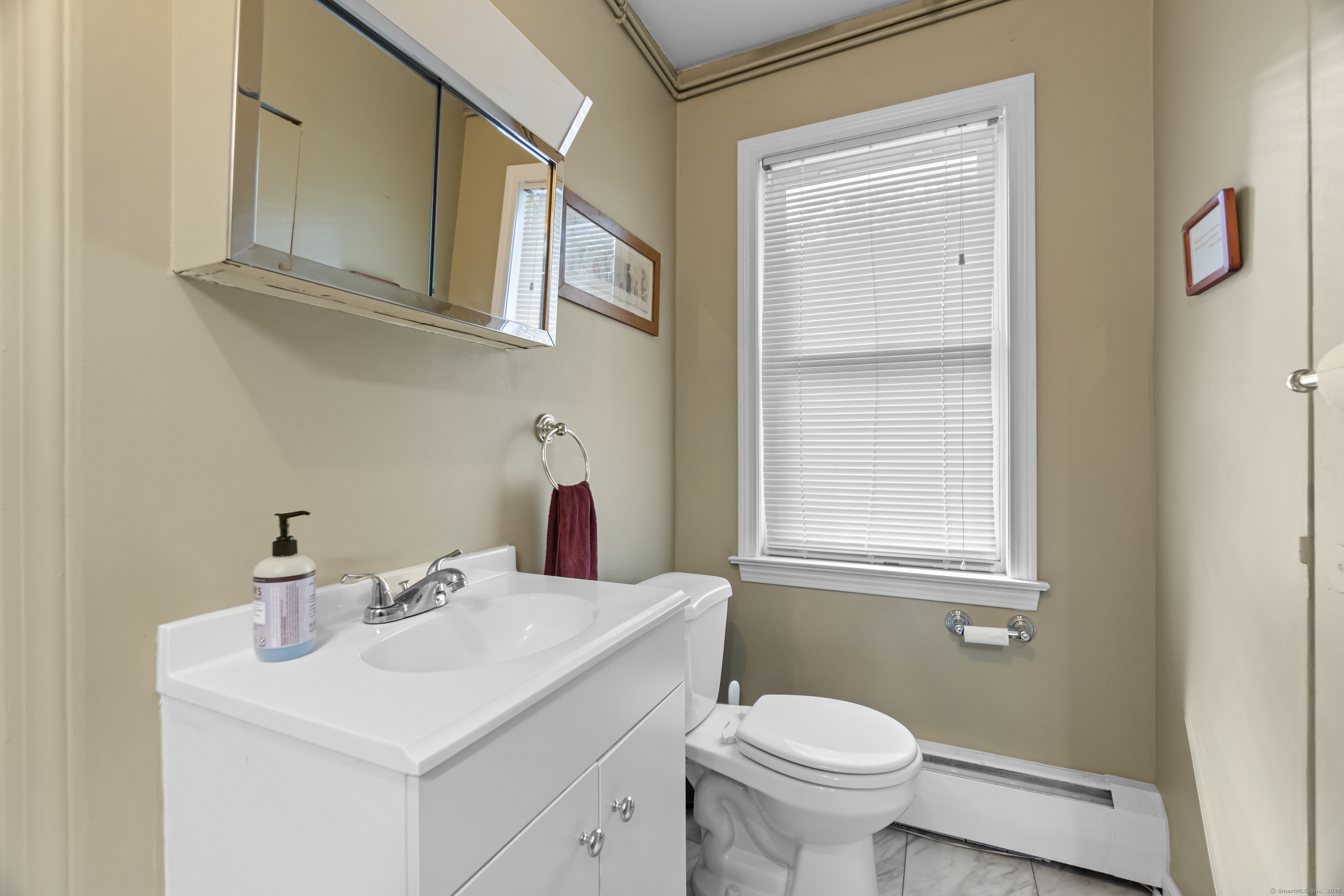 319 Main Street South Bethlehem, CT 06751 - Photo 6 of 33 a bathroom with a toilet sink and mirror