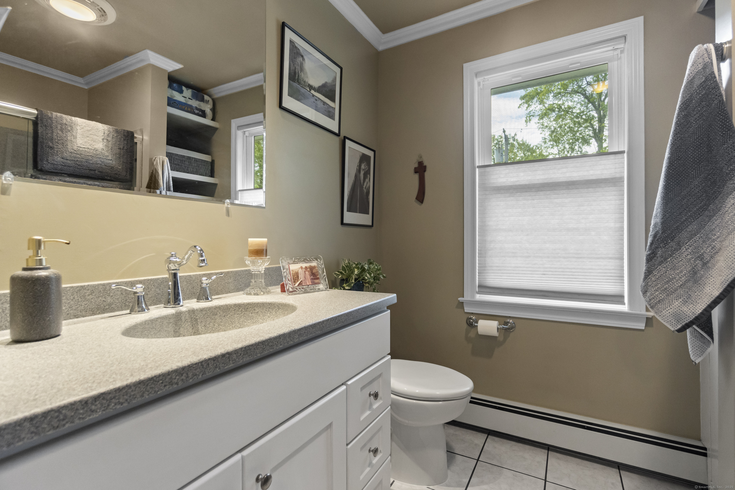 319 Main Street South Bethlehem, CT 06751 - Photo 10 of 33 a bathroom with a granite countertop sink toilet and mirror