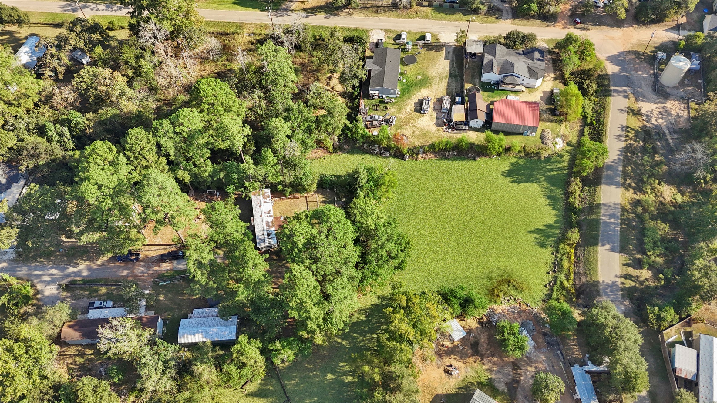 37111 Middle Trail, Unit 1 Magnolia, TX 77354 - Photo 25 of 32 a view of outdoor space with garden