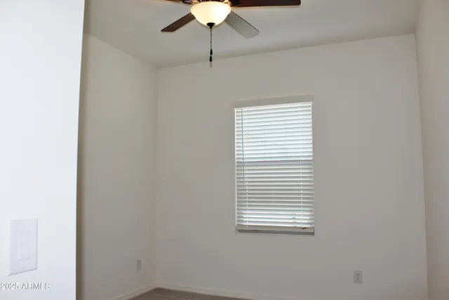 a view of a livingroom and a window