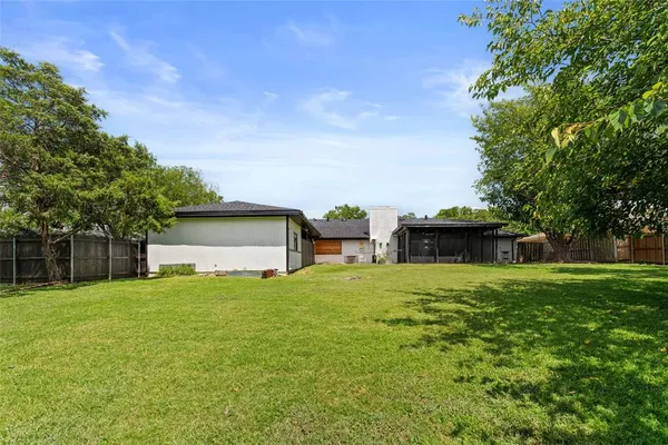 a house view with a garden space