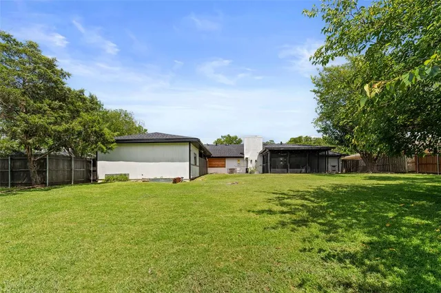 a house view with a garden space