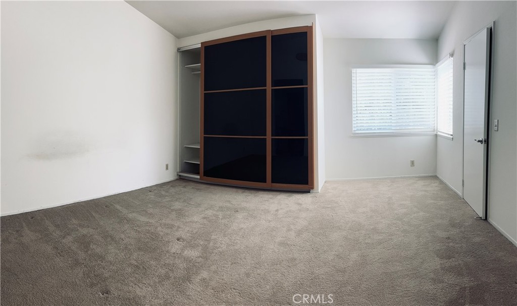 5 Glenhurst, Unit 5 Irvine, CA 92604 - Photo 12 of 16 an empty room with a window
