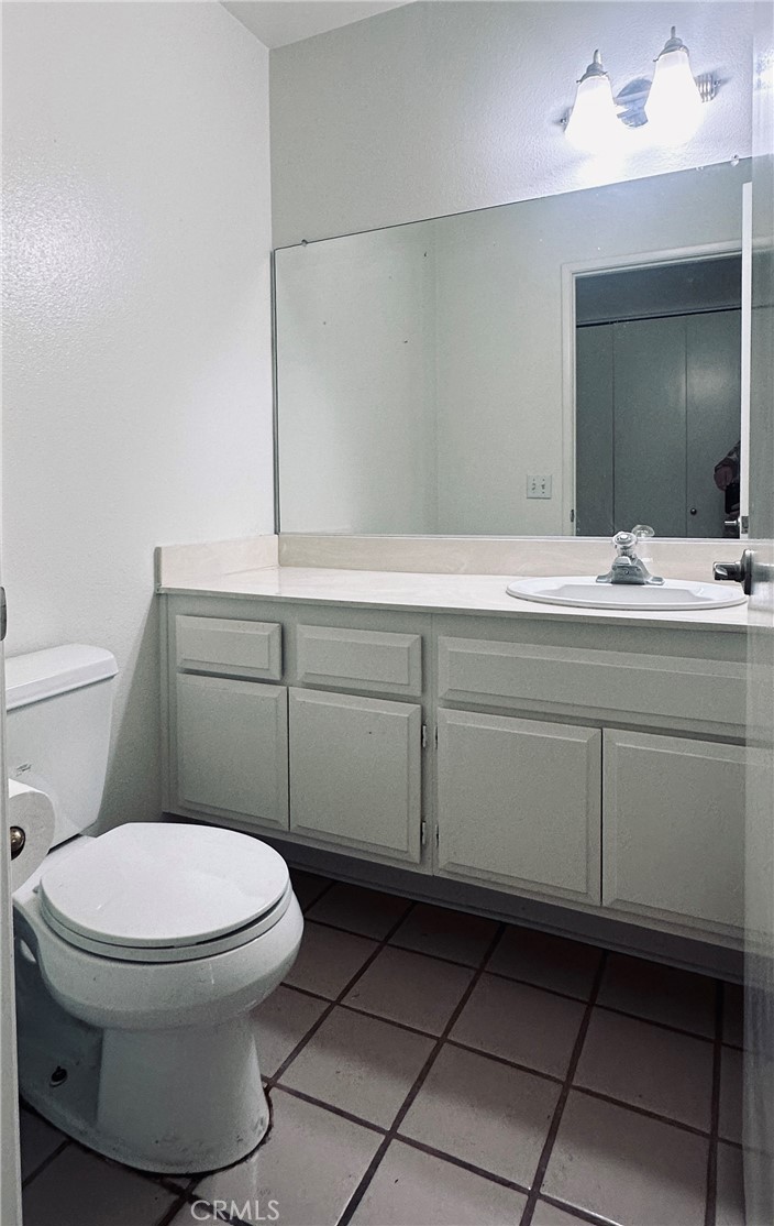 5 Glenhurst, Unit 5 Irvine, CA 92604 - Photo 16 of 16 a bathroom with a toilet and a sink