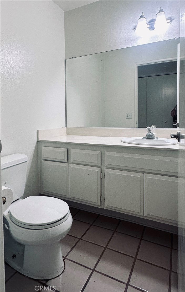 5 Glenhurst, Unit 5 Irvine, CA 92604 - Photo 10 of 16 a bathroom with a toilet and a sink