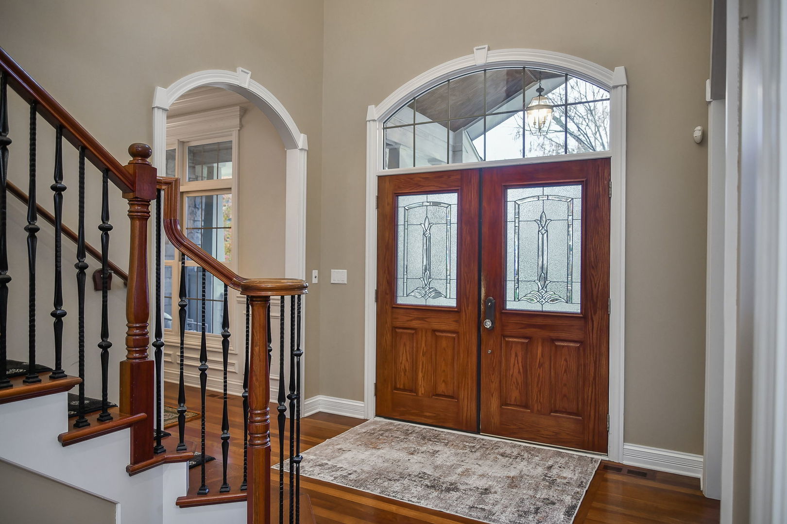 821 Wellner Road Naperville, IL 60540 - Photo 14 of 56 a view of front door with hallway