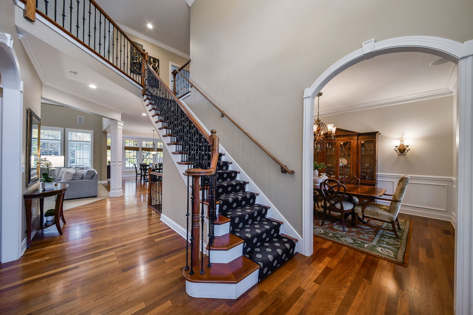 821 Wellner Road Naperville, IL 60540 - Photo 2 of 56 a view of entryway and dining room with wooden floor