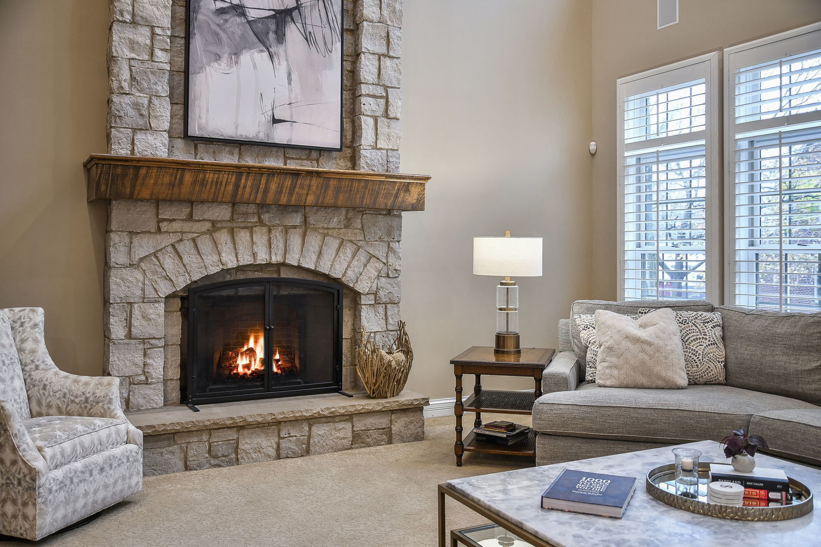 821 Wellner Road Naperville, IL 60540 - Photo 4 of 56 a living room with furniture and a fireplace