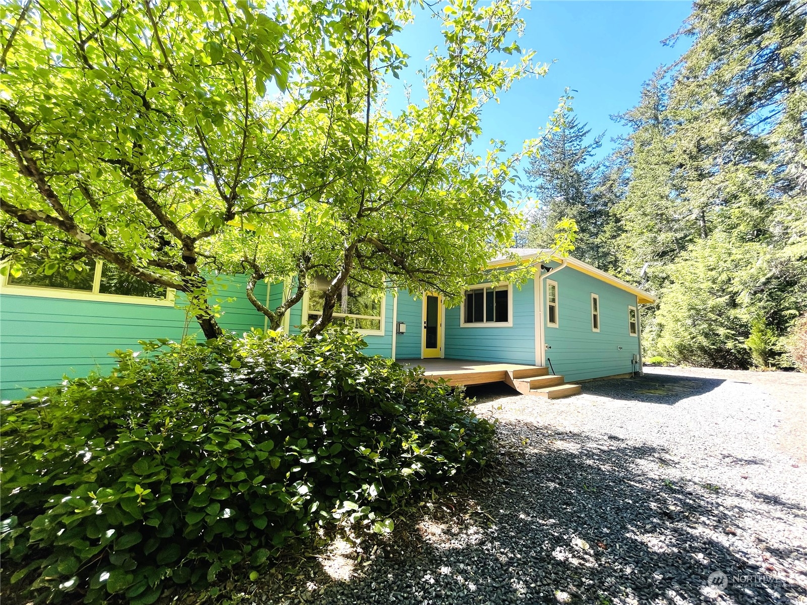 150 Carter Beach Road Friday Harbor, WA 98250 - Photo 11 of 39 a front view of a house with a yard