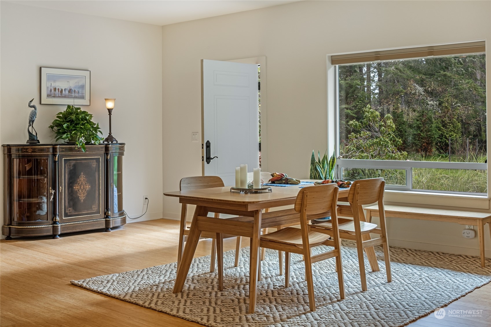 150 Carter Beach Road Friday Harbor, WA 98250 - Photo 18 of 39 a view of a dining room with furniture window and outside view