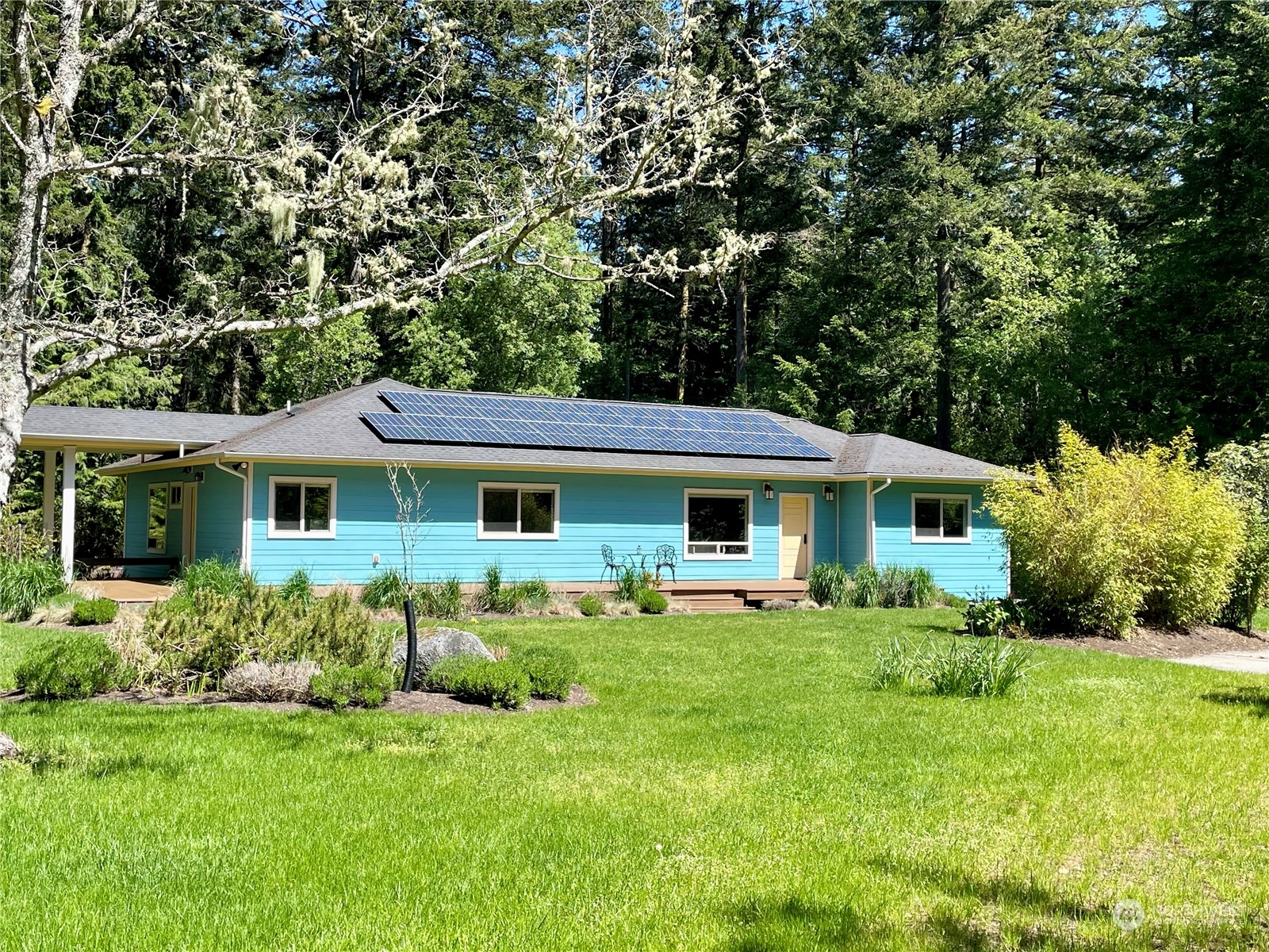 150 Carter Beach Road Friday Harbor, WA 98250 - Photo 2 of 39 a front view of house with yard and green space