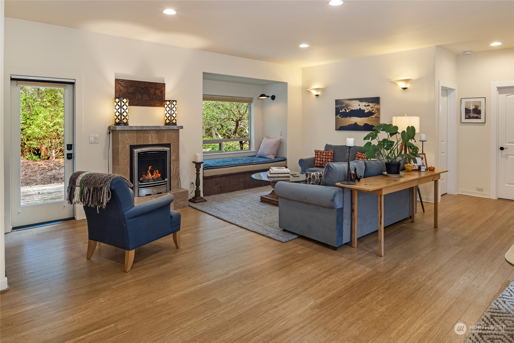 150 Carter Beach Road Friday Harbor, WA 98250 - Photo 23 of 39 a living room with furniture and a fireplace