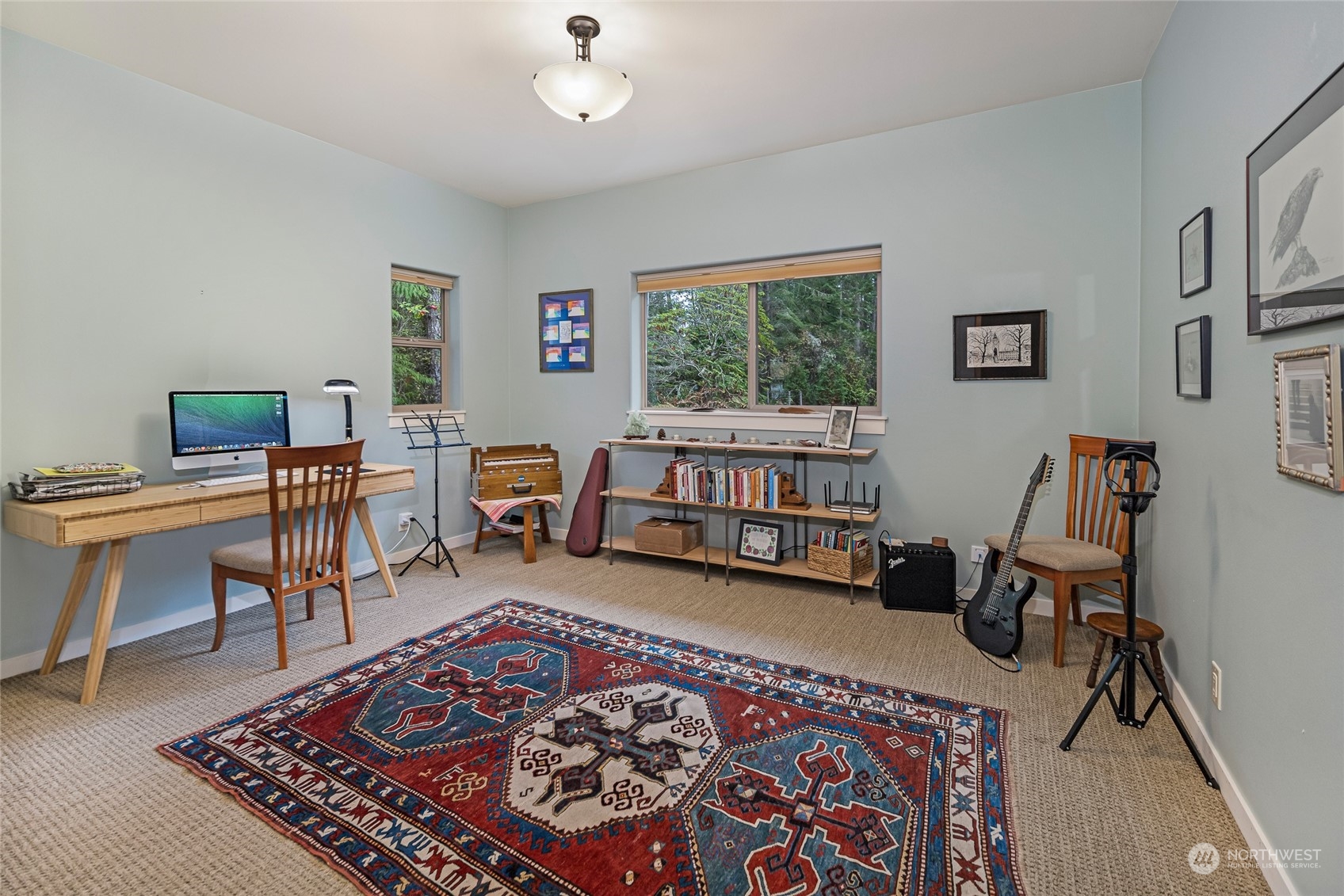 150 Carter Beach Road Friday Harbor, WA 98250 - Photo 33 of 39 a living room with furniture rug and a window
