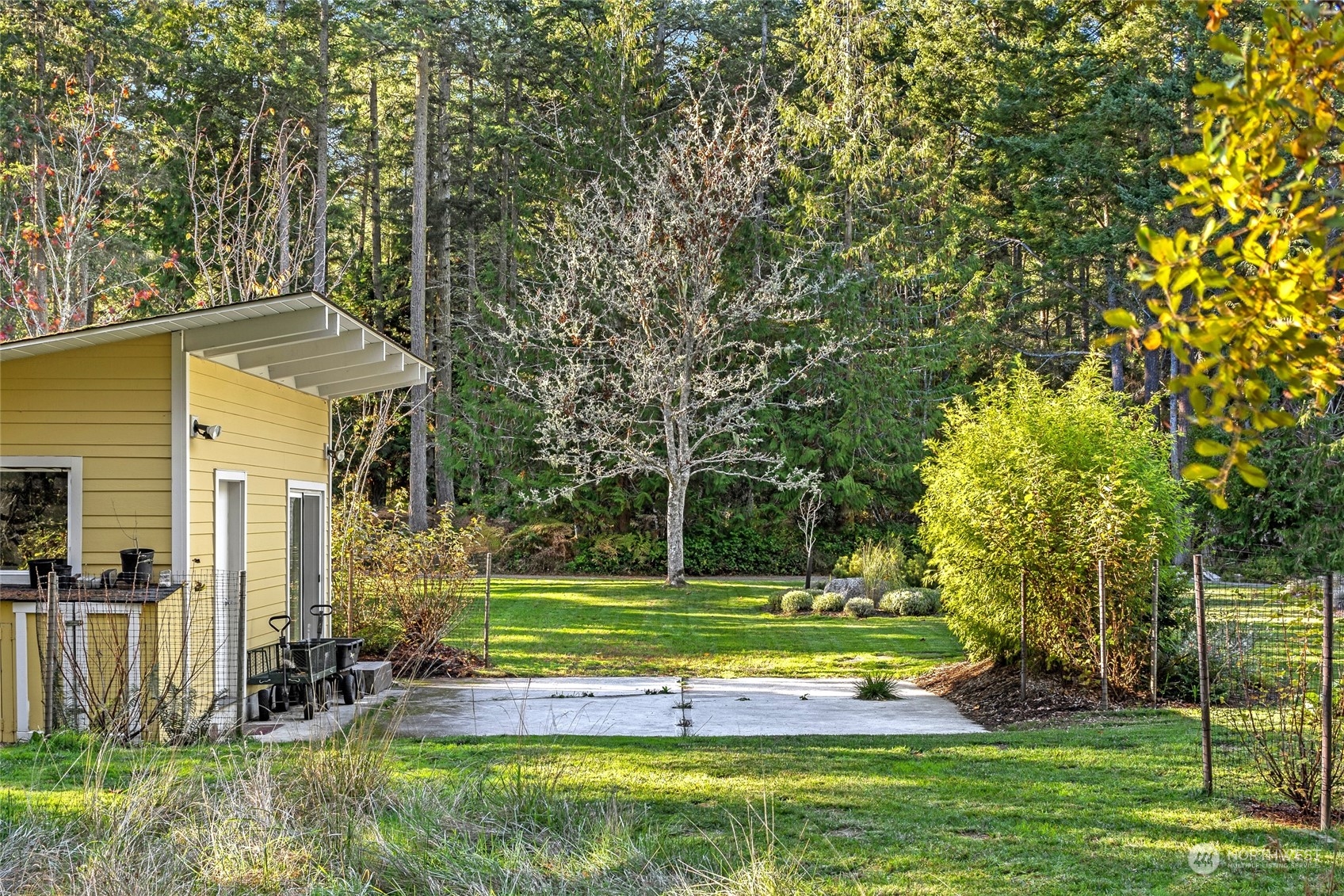 150 Carter Beach Road Friday Harbor, WA 98250 - Photo 36 of 39 a view of a swimming pool with a yard